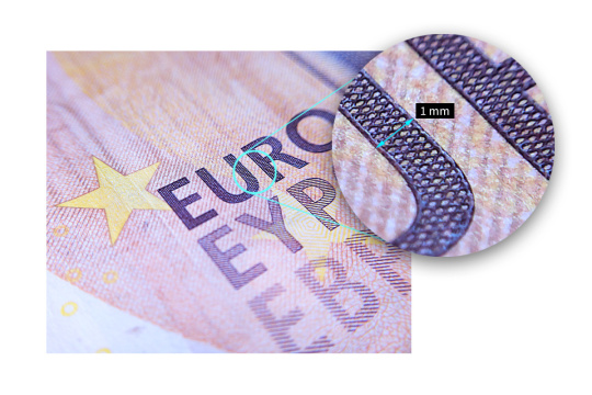 A euro note shows in an enlarged field how close the uEye XC can zoom.