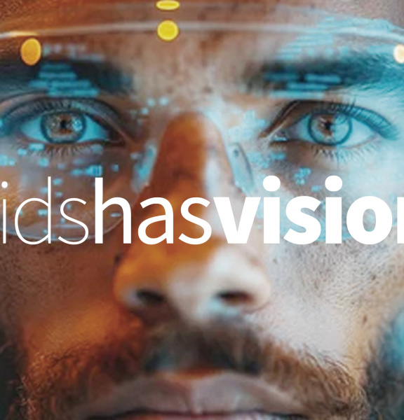 Male face with data glasses and text #idshasvision